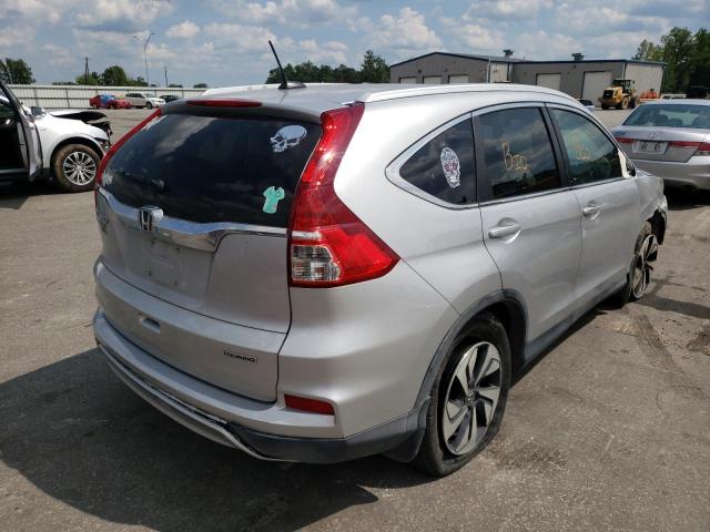 Photo 4 from auction – 2016 HONDA CR-V TOURI with VIN 5J6RM3H99GL016068