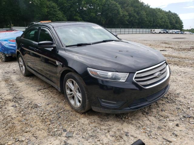 FORD TAURUS SEL 2014 with VIN 1FAHP2E81EG167612 - Photo from auction
