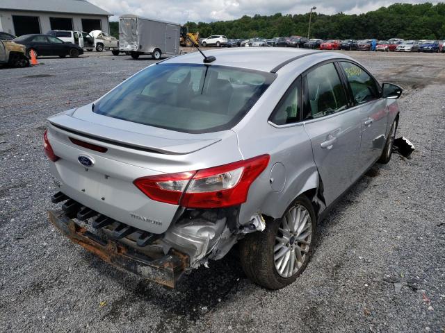 Photo 4 from auction – 2014 FORD FOCUS TITA with VIN 1FADP3J28EL344847