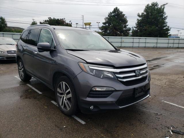HONDA PILOT TOUR 2016 with VIN 5FNYF6H99GB035817 - Photo from auction