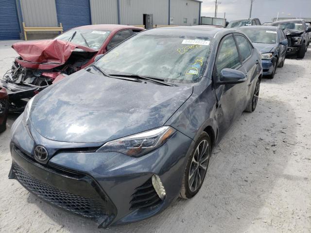 Photo 2 from auction – 2017 TOYOTA COROLLA L with VIN 2T1BURHE0HC827077