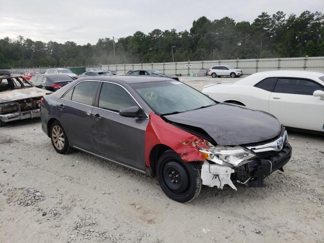 TOYOTA CAMRY HYBR 2014 with VIN 4T1BD1FK2EU130630 - Photo from auction