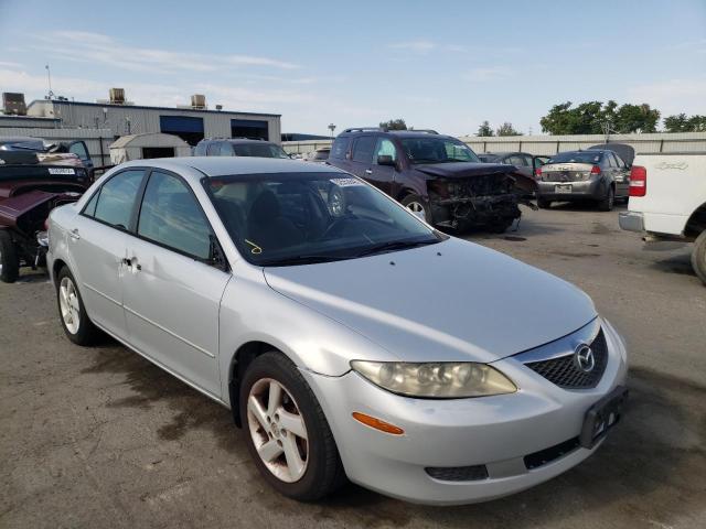Photo 9 from auction – 2003 MAZDA 323 with VIN 1YVFP80C435M40111