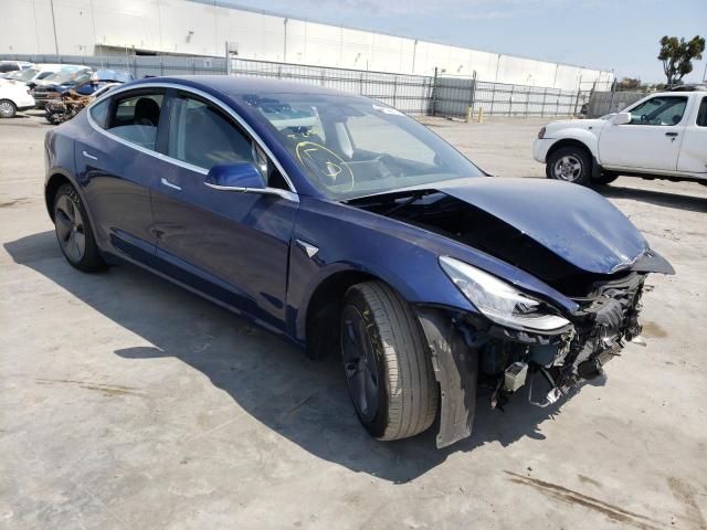 TESLA MODEL 3 2018 with VIN 5YJ3E1EAXJF077936 - Photo from auction