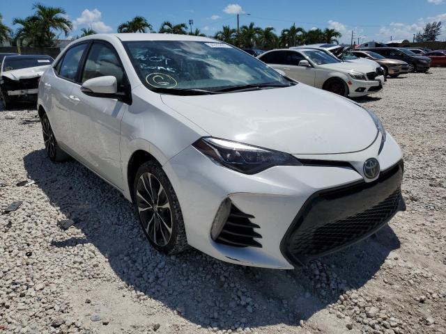 TOYOTA COROLLA L 2019 with VIN 5YFBURHE7KP909945 - Photo from auction