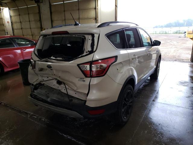 Photo 4 from auction – 2018 FORD ESCAPE SE with VIN 1FMCU9GD8JUA90972