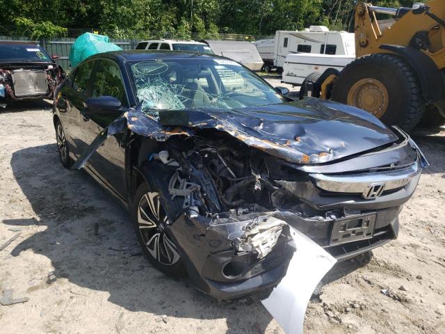 HONDA CIVIC EX 2018 with VIN JHMFC1F33JX034269 - Photo from auction