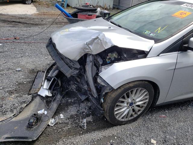 Photo 9 from auction – 2014 FORD FOCUS TITA with VIN 1FADP3J28EL344847