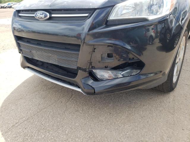 Photo 9 from auction – 2015 FORD ESCAPE SE with VIN 1FMCU9G92FUB20440