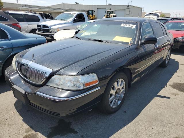 Photo 2 from auction – 2005 LINCOLN TOWN CAR E with VIN 1LNHM84W45Y619144