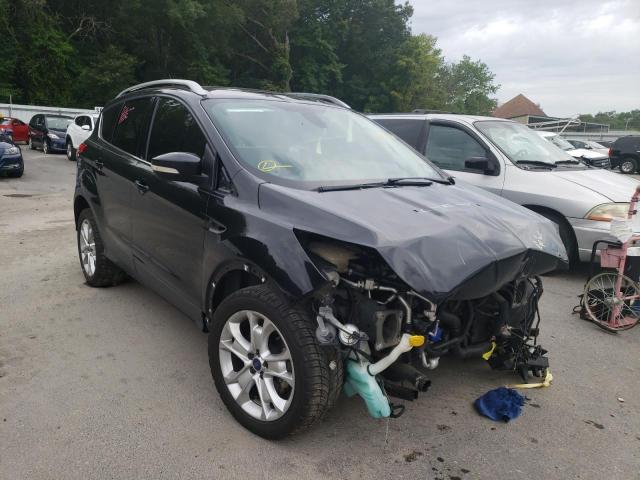 FORD ESCAPE TIT 2014 with VIN 1FMCU0JX5EUC41402 - Photo from auction