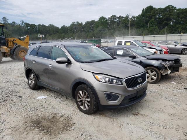 KIA SORENTO LX 2016 with VIN 5XYPG4A37GG101213 - Photo from auction