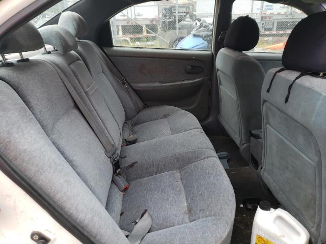 Photo 6 from auction – 2004 KIA OPTIMA LX with VIN KNAGD126445268615