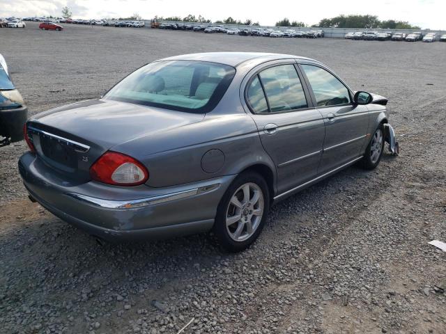 Photo 4 from auction – 2004 JAGUAR X-TYPE 2.5 with VIN SAJEB52D04XD92749