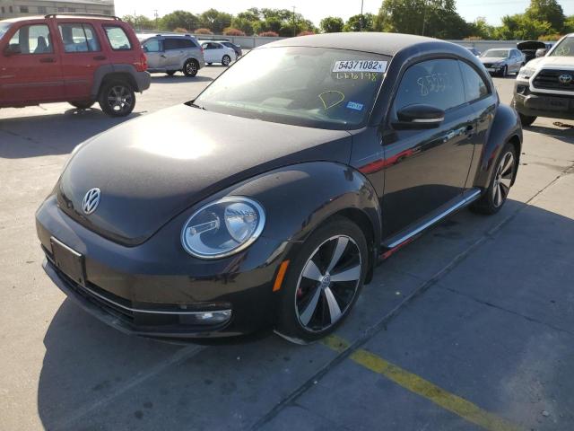 Photo 2 from auction – 2013 VOLKSWAGEN BEETLE TUR with VIN 3VWVA7AT4DM666198
