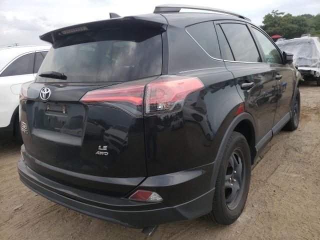 Photo 4 from auction – 2017 TOYOTA RAV4 LE with VIN 2T3BFREV6HW615613
