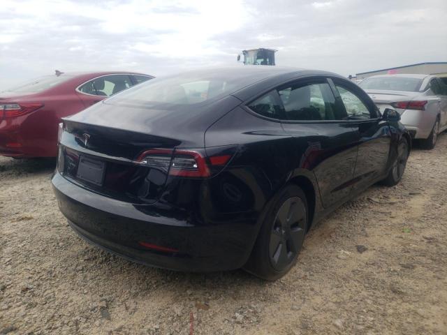 Photo 4 from auction – 2021 TESLA MODEL 3 with VIN 5YJ3E1EA3MF090371