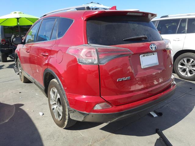 Photo 3 from auction – 2016 TOYOTA RAV4 LE with VIN JTMZFREV4GJ095472