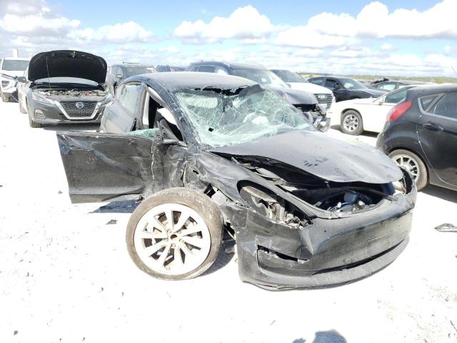 TESLA MODEL 3 2022 with VIN 5YJ3E1EA3NF184719 - Photo from auction