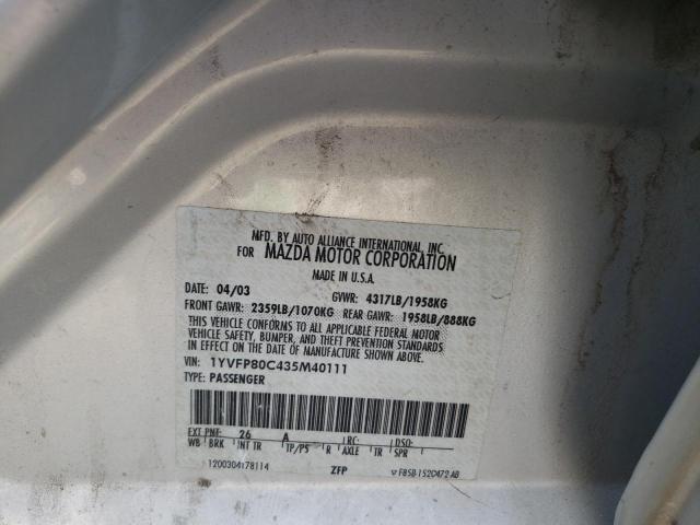 Photo 10 from auction – 2003 MAZDA 323 with VIN 1YVFP80C435M40111