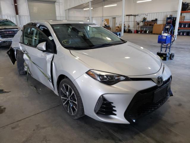 TOYOTA COROLLA L 2017 with VIN 2T1BURHE3HC810743 - Photo from auction