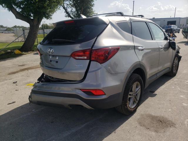 Photo 4 from auction – 2018 HYUNDAI SANTA FE S with VIN 5NMZU3LB0JH062042