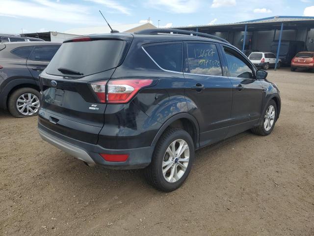 Photo 4 from auction – 2018 FORD ESCAPE SE with VIN 1FMCU9GD1JUB43351
