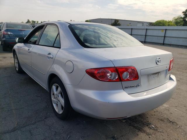 Photo 3 from auction – 2003 MAZDA 323 with VIN 1YVFP80C435M40111