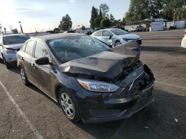 FORD FOCUS S 2015 with VIN 1FADP3E23FL281247 - Photo from auction