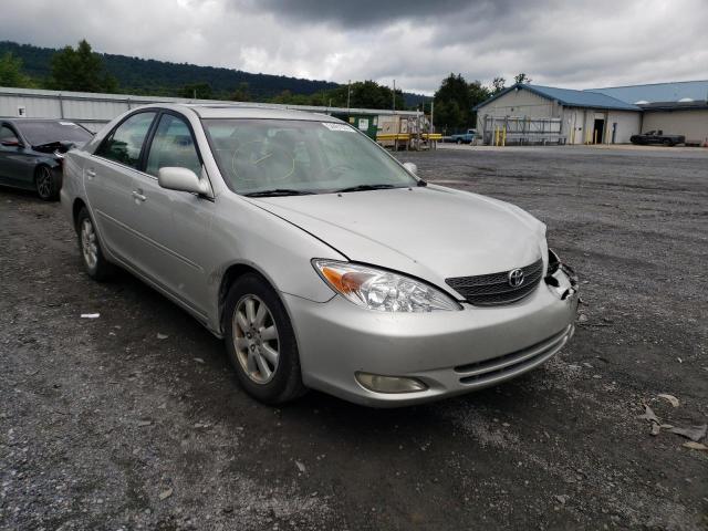 TOYOTA CAMRY LE 2004 with VIN 4T1BE30K74U897101 - Photo from auction