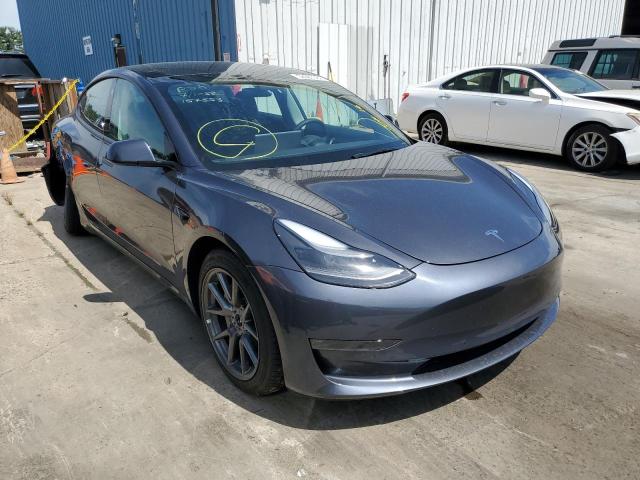 TESLA MODEL 3 2022 with VIN 5YJ3E1EB2NF157553 - Photo from auction