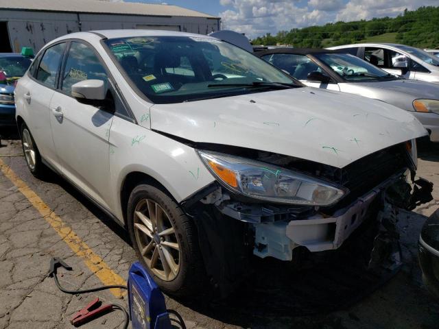FORD FOCUS SE 2015 with VIN 1FADP3F26FL242733 - Photo from auction