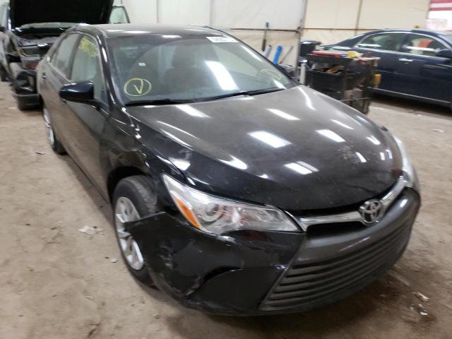 TOYOTA CAMRY LE 2017 with VIN 4T1BF1FKXHU704132 - Photo from auction
