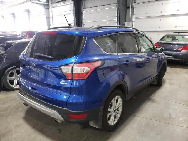 Photo 4 from auction – 2018 FORD ESCAPE SE with VIN 1FMCU9GD5JUB13639