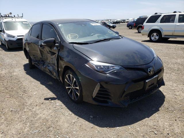 TOYOTA COROLLA L 2018 with VIN 5YFBURHEXJP794143 - Photo from auction