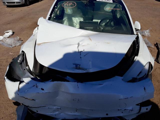 Photo 7 from auction – 2021 TESLA MODEL 3 with VIN 5YJ3E1EA0MF073494