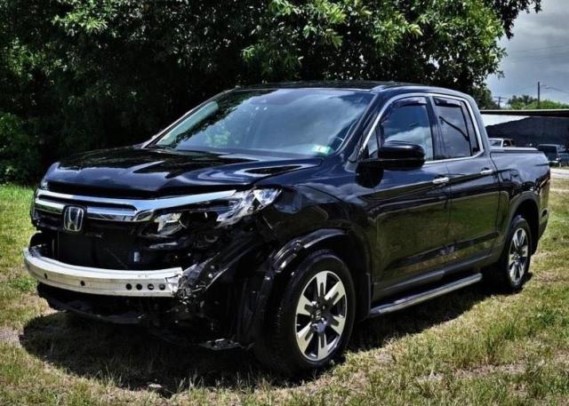 Photo 2 from auction – 2017 HONDA RIDGELINE with VIN 5FPYK3F70HB002807