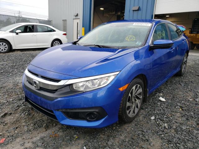Photo 2 from auction – 2018 HONDA CIVIC LX with VIN 2HGFC2F65JH036774