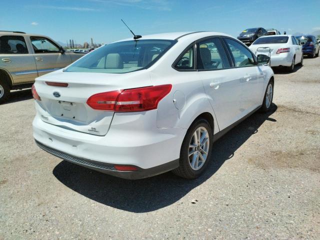 Photo 4 from auction – 2016 FORD FOCUS SE with VIN 1FADP3F29GL221926