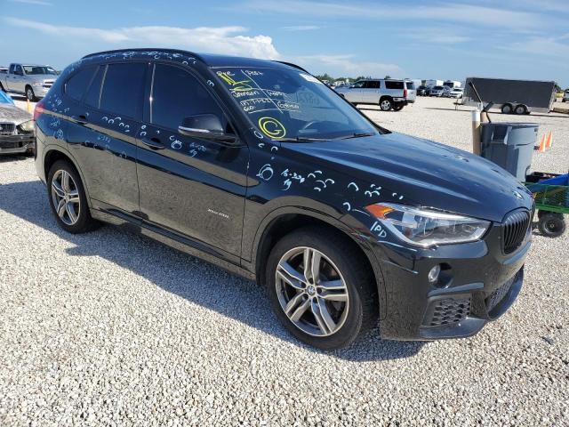 BMW X1 XDRIVE2 2017 with VIN WBXHT3C39H5F74697 - Photo from auction