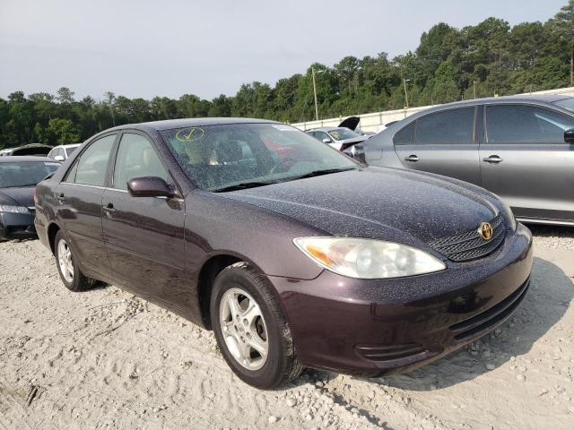 TOYOTA CAMRY LE 2002 with VIN JTDBE32K420006672 - Photo from auction