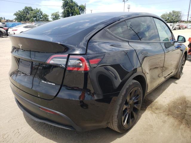 Photo 4 from auction – 2021 TESLA MODEL Y with VIN 5YJYGDEEXMF183103