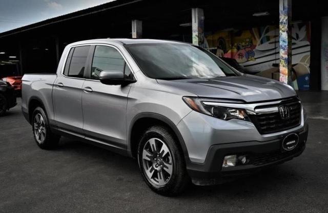 HONDA RIDGELINE 2019 with VIN 5FPYK2F50KB002080 - Photo from auction