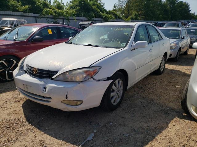 Photo 9 from auction – 2004 TOYOTA CAMRY LE with VIN 4T1BF30K54U075491