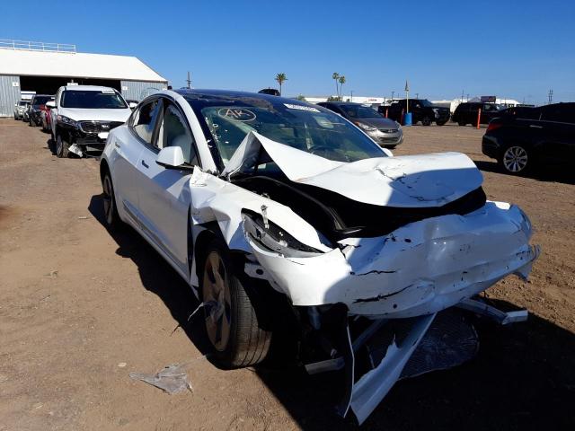 TESLA MODEL 3 2021 with VIN 5YJ3E1EA0MF073494 - Photo from auction
