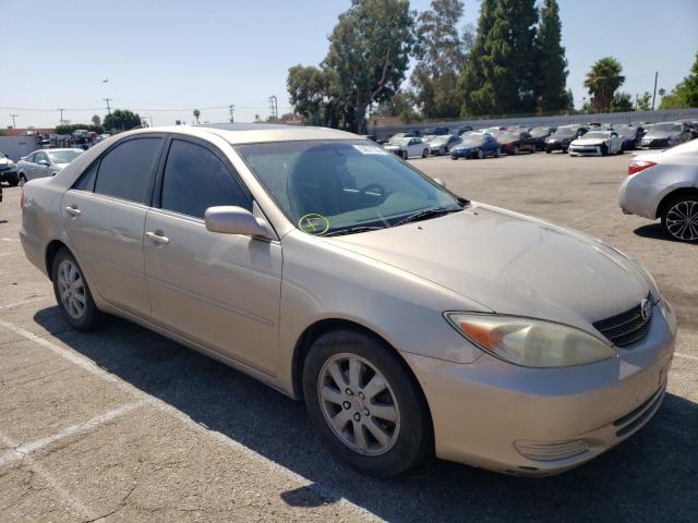 TOYOTA CAMRY LE 2002 with VIN 4T1BF32K92U539540 - Photo from auction