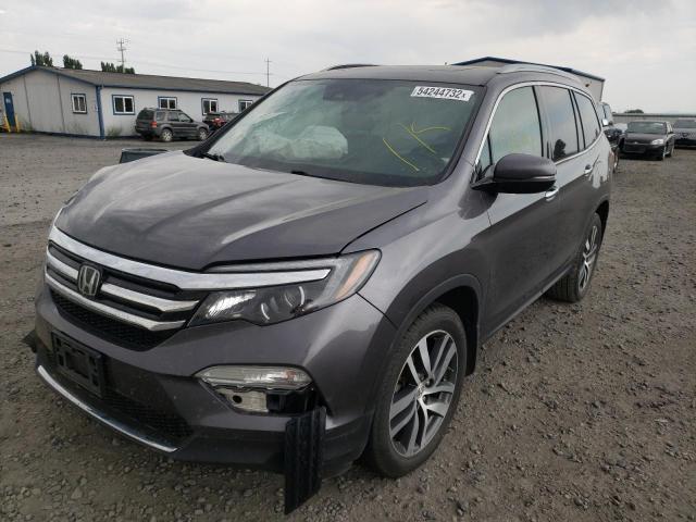 Photo 2 from auction – 2017 HONDA PILOT ELIT with VIN 5FNYF6H06HB087294