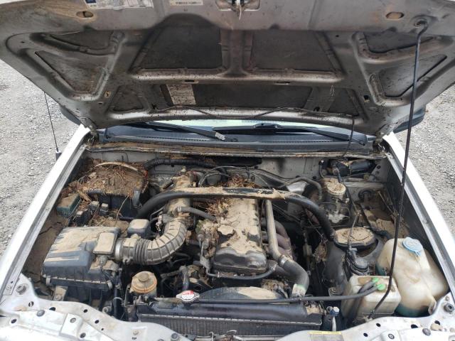 Photo 7 from auction – 2002 CHEVROLET TRACKER with VIN 2CNBJ13C326916209