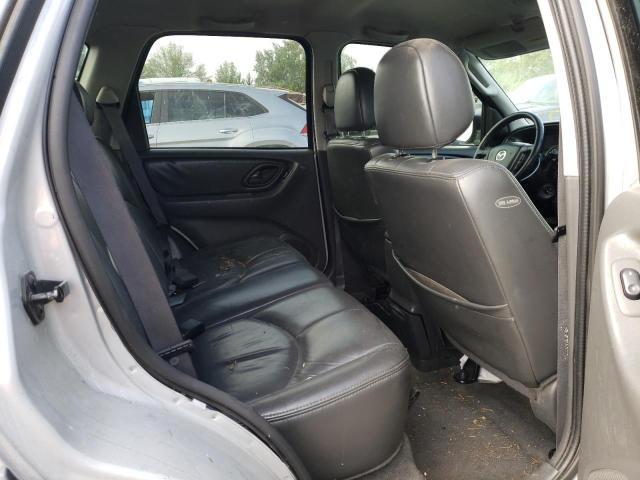 Photo 6 from auction – 2004 MAZDA TRIBUTE ES with VIN 4F2CZ96154KM02050