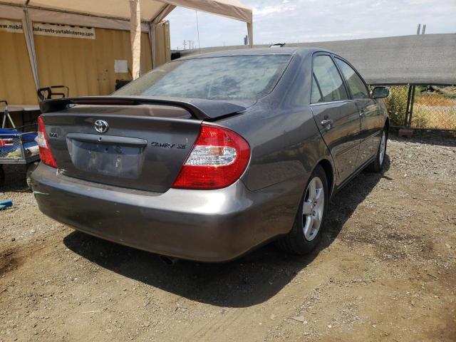 Photo 4 from auction – 2002 TOYOTA CAMRY LE with VIN JTDBE30K920042232